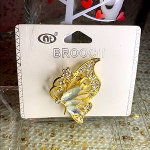 N. T. Crystal & Stone Brooch.